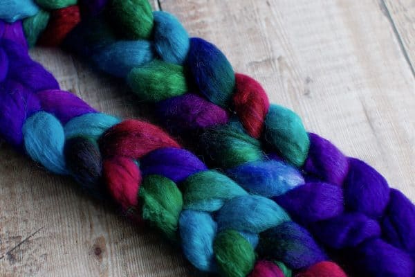 blue green violet braided wool roving closeup